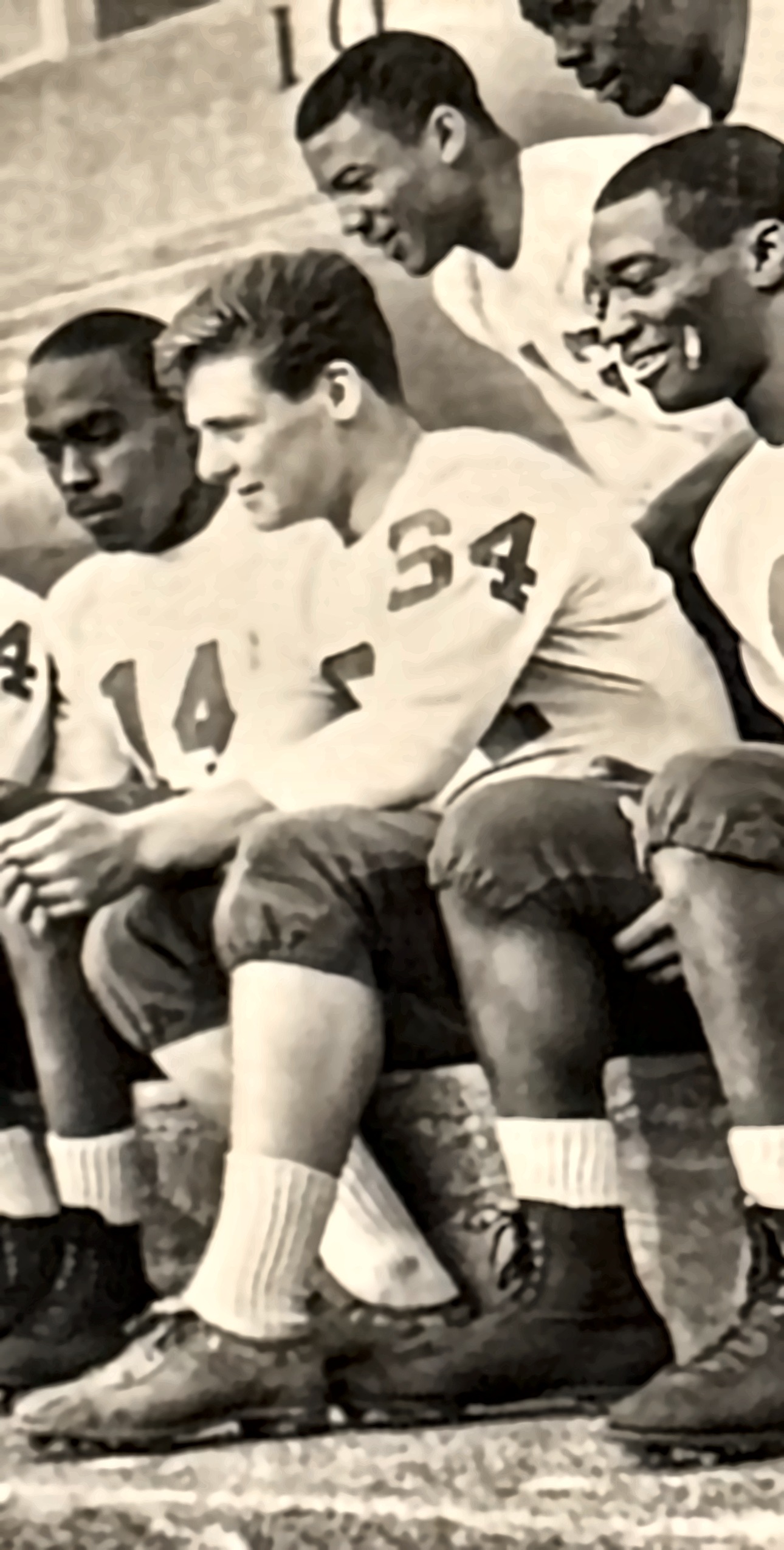 Ron Manzella on the bench in his playing days, wearing number 54.
